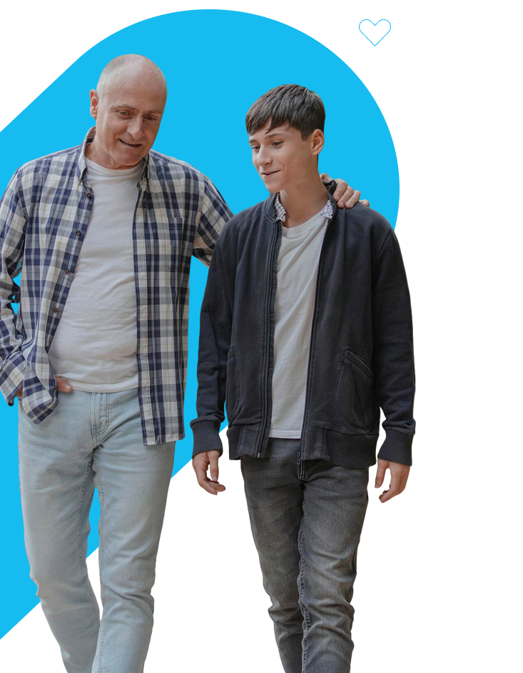 older man and younger man walking and talking